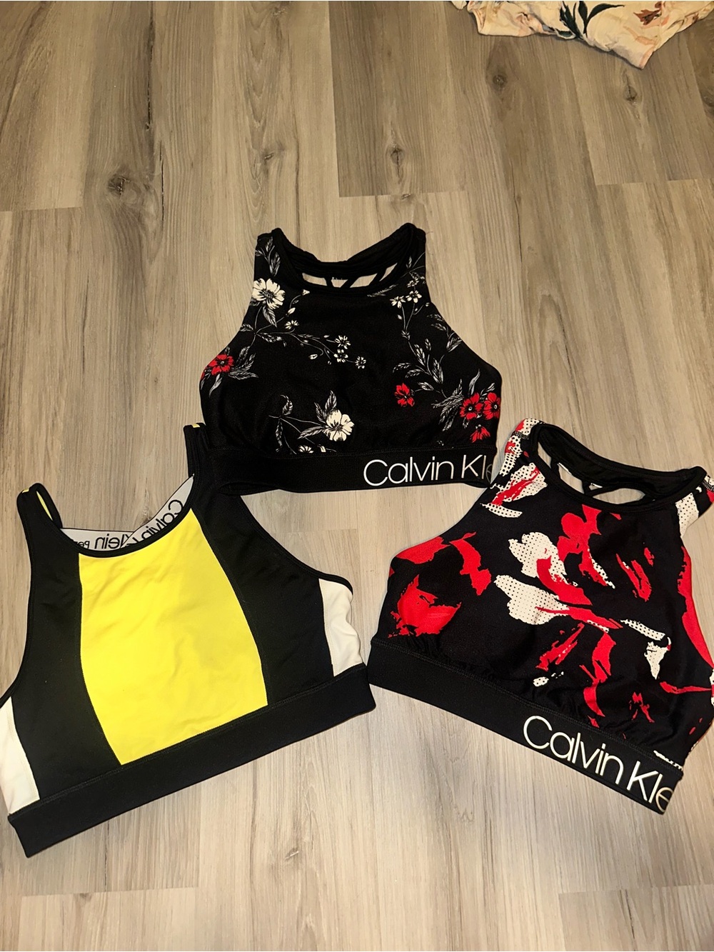 Calvin Klein Black Floral Sports Bra with Red Detail